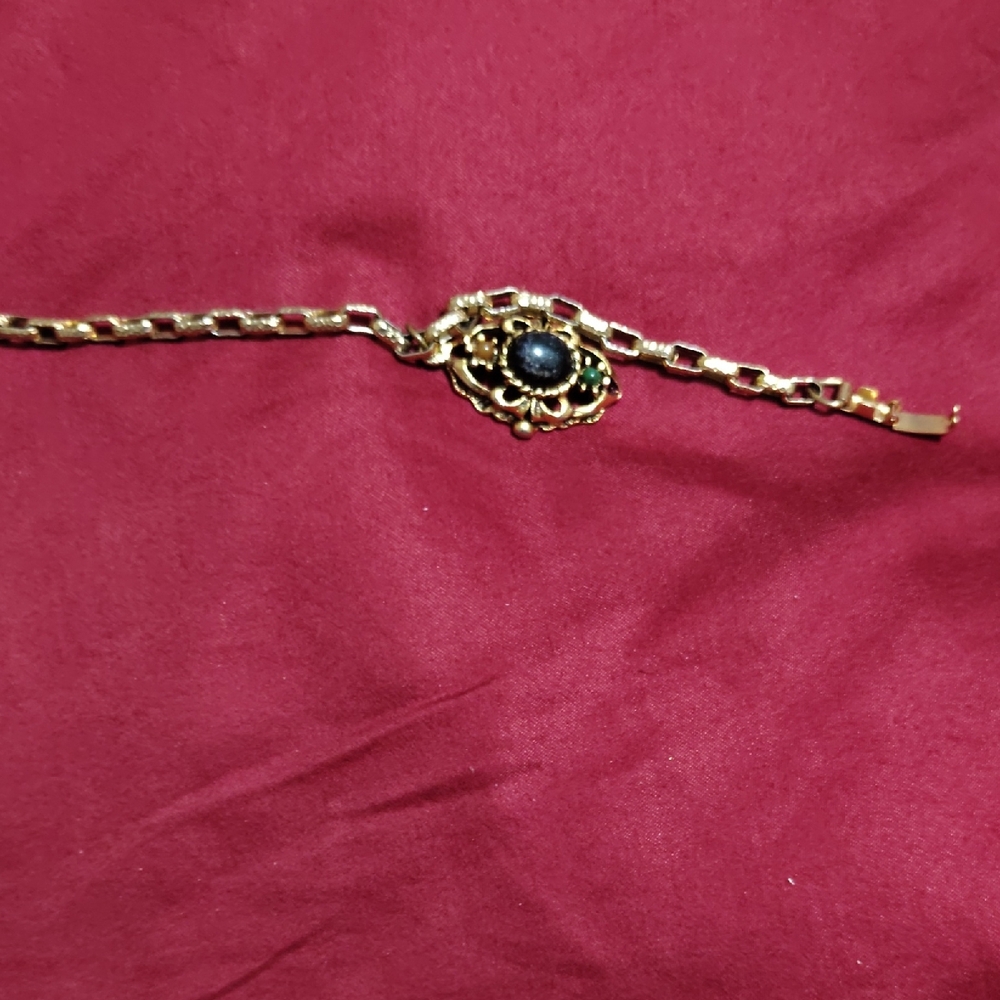 Elegant Gold Bracelet with Black Stone